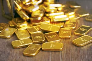 Gold bar spill out from treasure chest